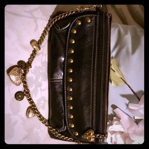Black clutch with detachable charm chain handles